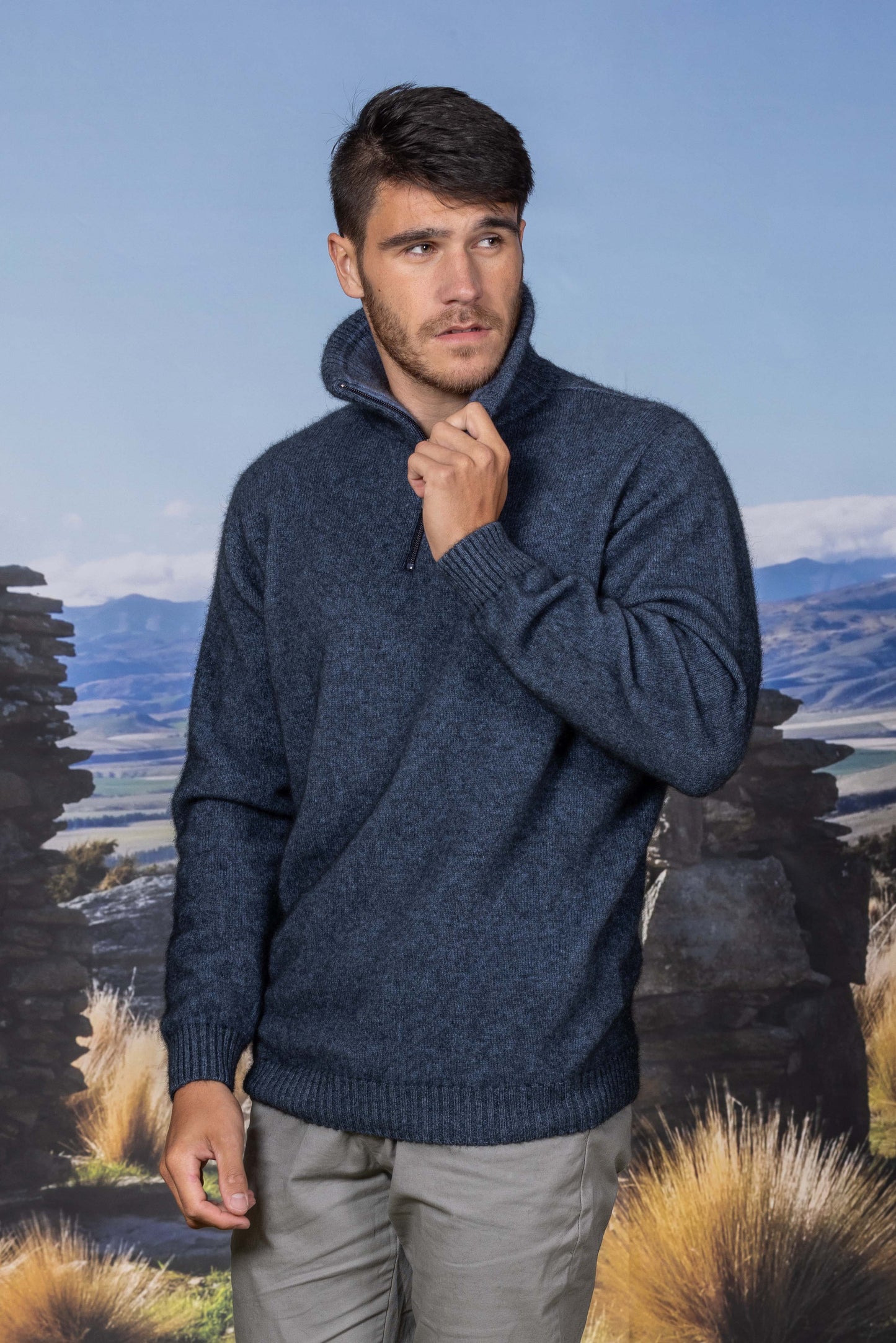 This classic zip neck sweater with solid colour body and contrast colour inside the rib collar. The collar can be turned down or zipped right up. Single jersey knit, WholeGarment seamless construction. Made from a blend of possum merino and available sizes: S - 3XL. Made in Christchurch, NZ by Noble Wilde. Neptune.