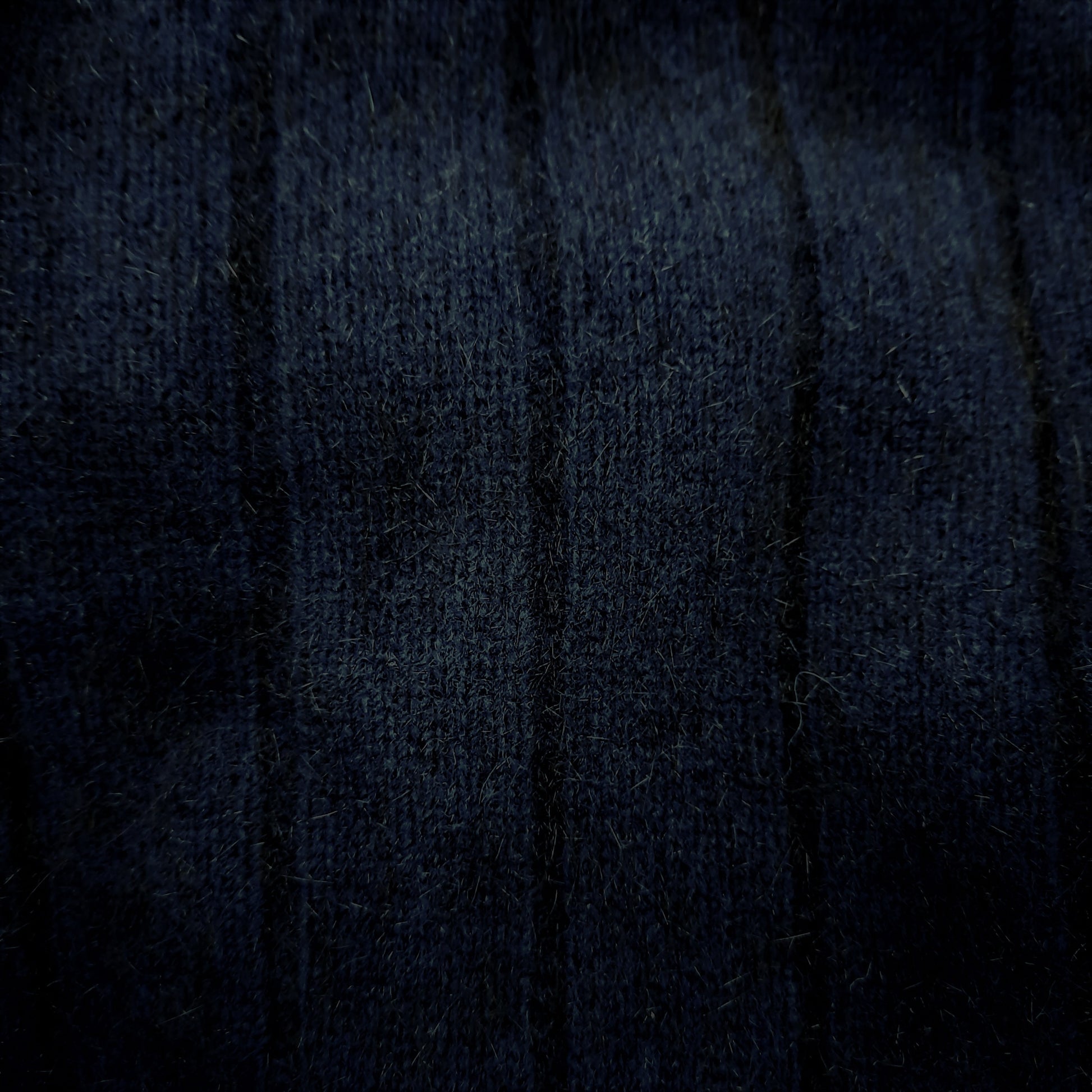 A men's possum merino ribbed full zip jacket with collar. It can be worn open or zipped up for extra warmth. Great with jeans or dress pants. Made in NZ by Lothlorian for their Zinity Collection. Available in sizes S, M, L, XL, XXL. Midnight.