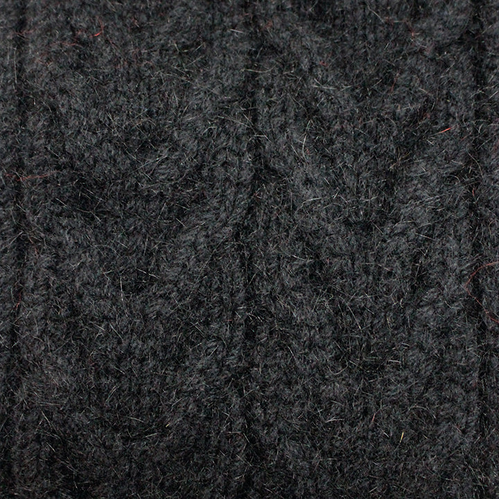 This chunky cable knit scarf with Rabbit fur pom poms is soft and warm.  Colour black with black pom poms.