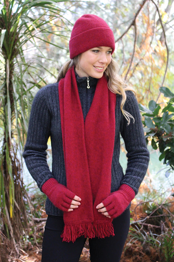 This double thickness scarf is made from possum merino blend and is approximately 17cm wide and 170cm long. Add another 7cm of fringing. Perfect winter wearing!! Made in NZ by Lothlorian.