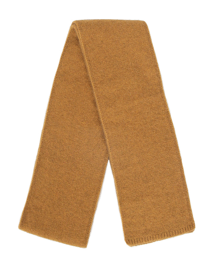 A luxurious double thickness scarf with narrow rib bands. A generous length at 175cm long & 14cm wide. Possum merino blend scarf made in NZ by Lothlorian. Gold.