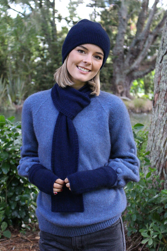 A double thickness beanie with rib (no turnback) sits close to the skull. Made from a possum merino blend by Lothlorian, NZ. Midnight.