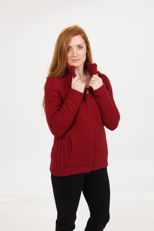 The Essential Jacket is a must have winter jacket that's simplicity never goes out of style. Its stylish design allows cozy warmth while still looking good and being comfortable. Featuring a full zip for ease of wearing and front pockets. Combining the qualities and natural warmth of fine Merino Wool with the softness of Possum fur to produce this exclusive garment. Sizes S - 2XL - Regular Fit. Made at Manawatu Knitting Mills in Palmerston North, NZ. Berry.