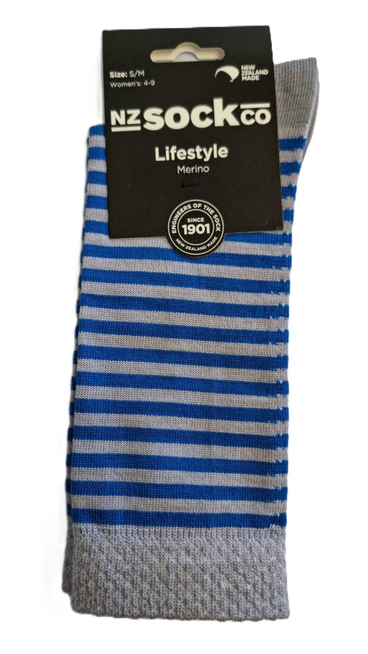 Women's fine knit Merino Stripe socks are ideal for dress or casual wear with a variety of footwear. Constructed with a low compression, diamond knit cuff for comfort. The reinforced heel and toe areas with nylon plated to the exterior of the sock adds durability. Made in NZ by NZ Sock Co.