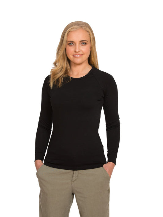 Designed with a crew neck this merino long sleeve tee can be worn on it's own or as a base or mid layer. Has a shaped tail at the back to tuck in. Perfect all year round!! This is a slim fit top so size up if you prefer a little wiggle room. Available in black only. Sizes S - 3XL. Proudly made in NZ.