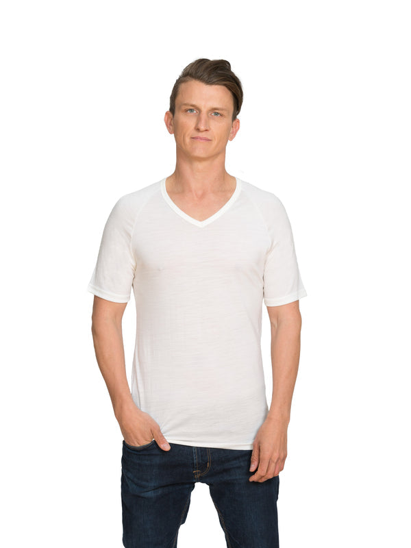 Designed with a vee neck this merino short sleeve tee can be worn on its own or as a base or mid layer. Perfect all year round!! This is a slim fit tee so size up if you prefer a little wiggle room. Available in ivory white only. Sizes S - 3XL. Proudly made in NZ.