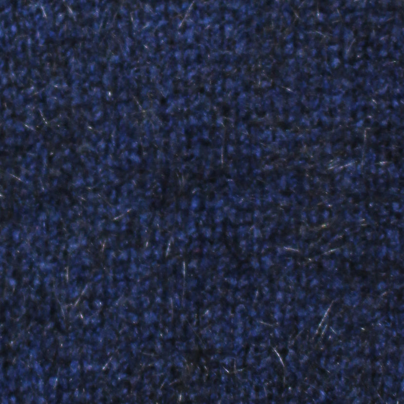 A classic crew neck style made from possum merino, with rib finish on neck, cuff and band. A wardrobe staple for year-round wear. Dress up or down. Available in sizes S, M, L, XL, XXL. Made in NZ by Lothlorian. Midnight.