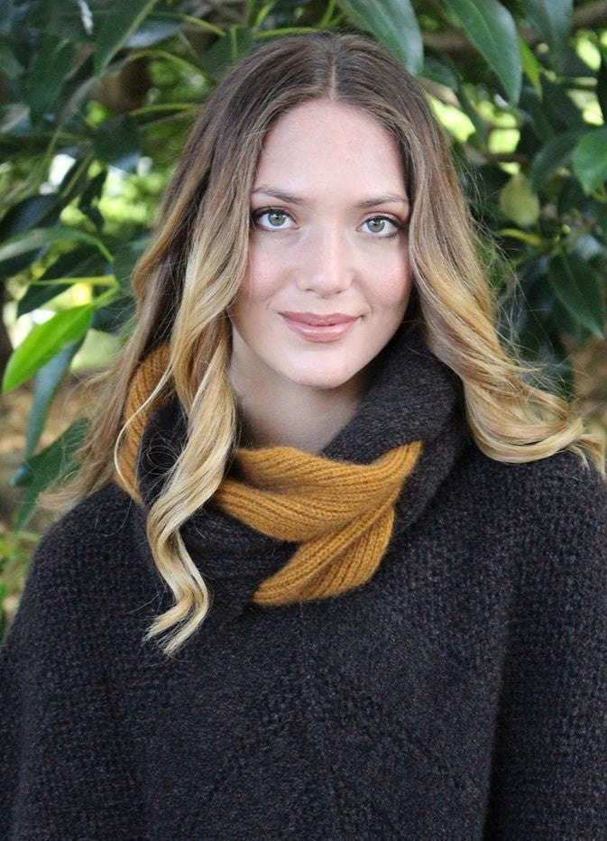 The Plait Cowl is a two colour interlaced infinity scarf. Knitted in a 1x1 rib it is luxurious, soft and warm. Perfect to wear over a top or with a coat for a little extra pop of colour. Available in four colourways and one size only. Made by Lothlorian of NZ in a possum merino blend.
