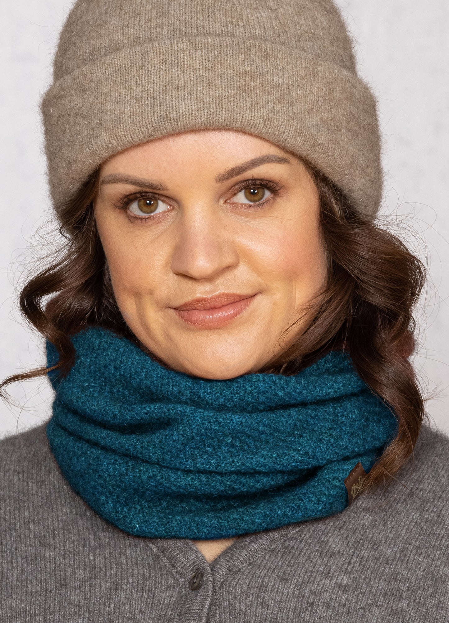 This fashion one piece neck warmer is knitted in a moss stitch. It can be worn scrunched down or folded down. Made from a blend of possum merino and available in one size only. Made in Christchurch, NZ by Noble Wilde.