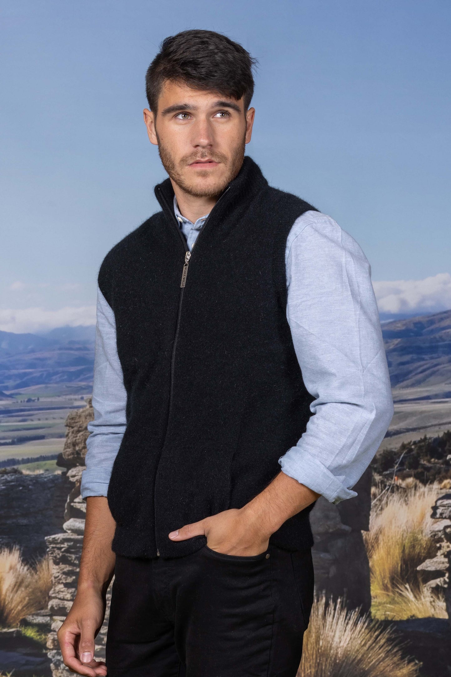The Gilet zip through vest with integrated pockets is a perfect mid or outer layer. A regular fit in single jersey, WholeGarment seamless construction. Great for a casual look with a tee, collar & tie for work or over a jumper on those really chilly days! Made from a blend of possum merino and available sizes: S - 3XL. Made in Christchurch, NZ by Noble Wilde. Black.