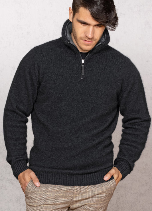  This classic zip neck sweater with solid colour body and contrast colour inside the rib collar. The collar can be turned down or zipped right up. Single jersey knit, WholeGarment seamless construction. Made from a blend of possum merino and available sizes: S - 3XL. Made in Christchurch, NZ by Noble Wilde. Charcoal.