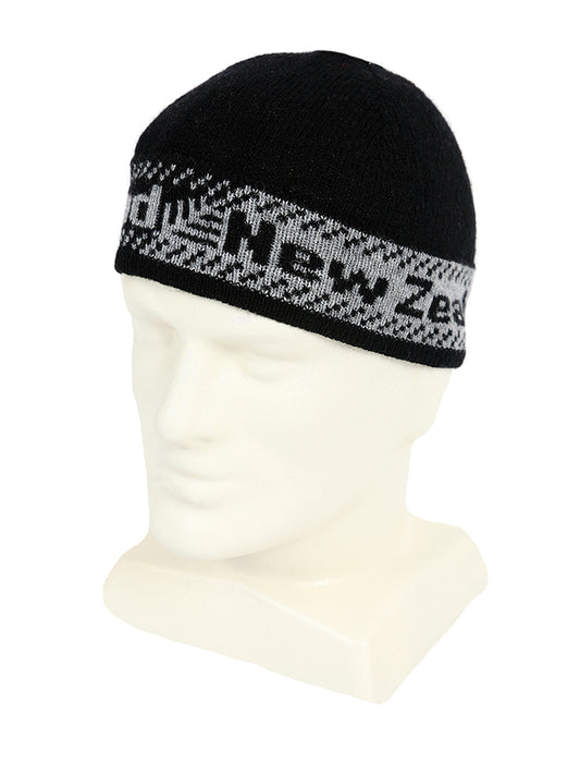 A skull style beanie with New Zealand and fern pattern around the band in contrasting colour. Made in NZ by Lothlorian. Black/Silver
