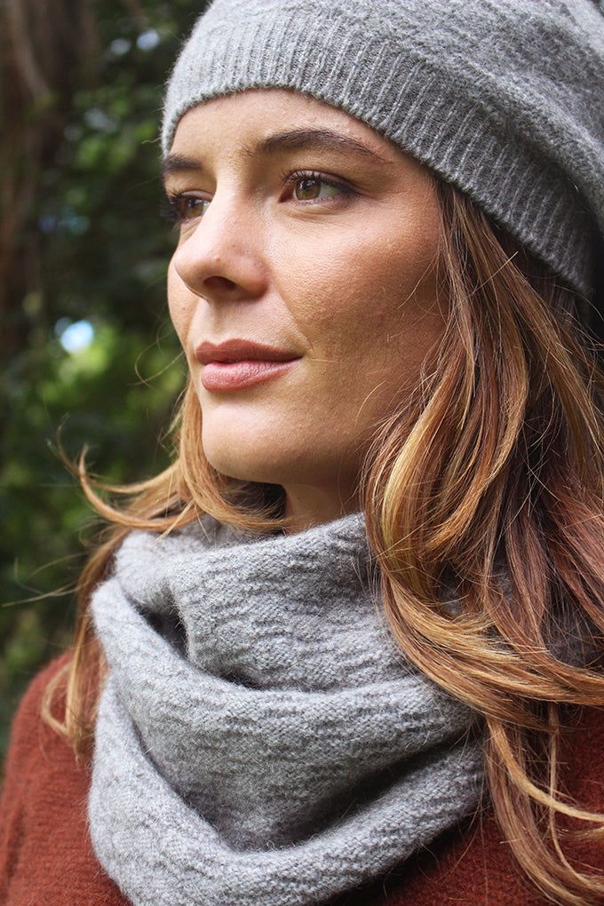 This versatile knitted tube with a beautifully textured knit structure makes it so simple to stay warm without compromising on style. It's snug fit and softness makes it ideal for layering over jumpers, jackets and coats, providing an extra layer of comfort around the neck where you need it most. Comes in One Size only.