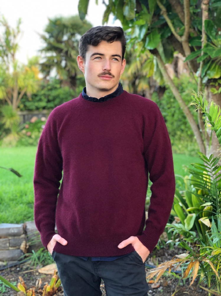 A classic crew neck style made from possum merino, with rib finish on neck, cuff and band. A wardrobe staple for year-round wear. Dress up or down. Available in sizes S, M, L, XL, XXL. Made in NZ by Lothlorian. Pinot.