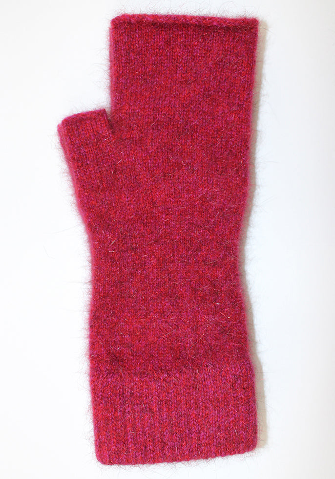 Ideal for wearing anytime and anywhere. Fingerless mittens are light, warm and practical. One size fits most with Lycra added to the wrist area for a secure fit. Made in NZ by Lothlorian. Raspberry.