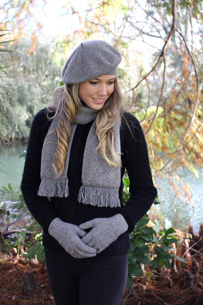 A single thickness beret in plain knit from a possum merino blend. Lots of glorious colours to choose from.  Made in NZ by Lothlorian. Silver.