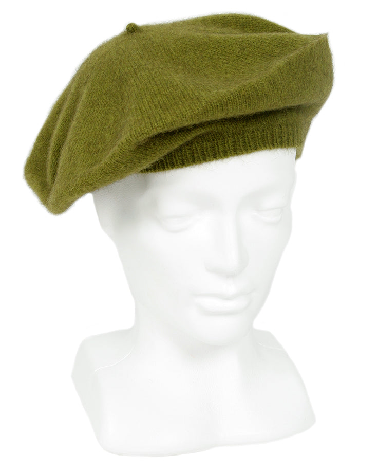 A single thickness beret in plain knit from a possum merino blend. Lots of glorious colours to choose from. Made in NZ by Lothlorian. Olive.