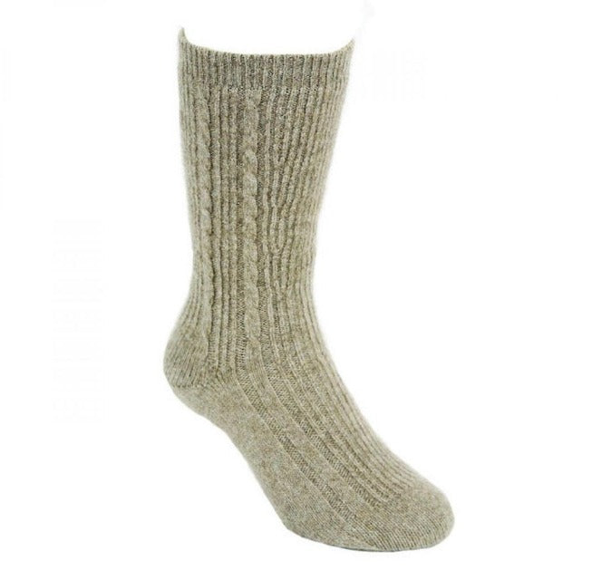 These light ribbed socks with cable detail and comfort band have been especially designed to eliminate any pressure points. Perfect for diabetics or others with circulation issues. Available in S, M, L & XL. Made in NZ by Lothlorian. Natural.