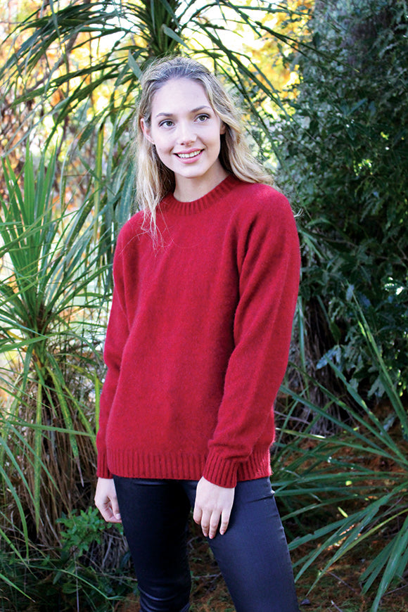 A classic & versatile crew neck jumper with 2x2 rib around the neck, cuffs and band. A possum merino blend available in sizes XS-XXL. Made in NZ by Lothlorian. NOTE * after colour denotes a custom colour to our store, not always readily available. Red