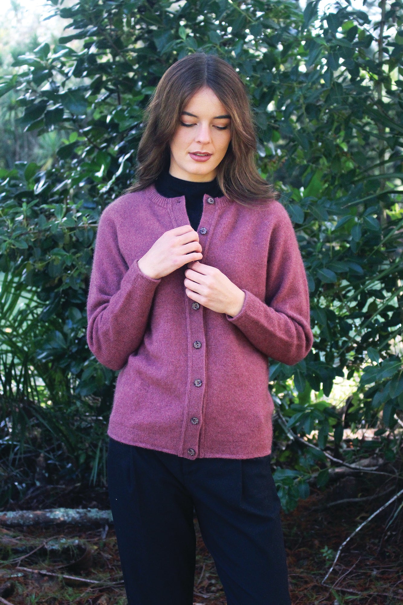 A timeless crew neck, button through cardigan. Great for layering up. Wear open or buttoned up as a top layer. A possum merino blend available in sizes XS - XXL. Made in NZ by Lothlorian. NOTE: * after colour denotes a custom colour to our store, not always readily available. Orchid.
