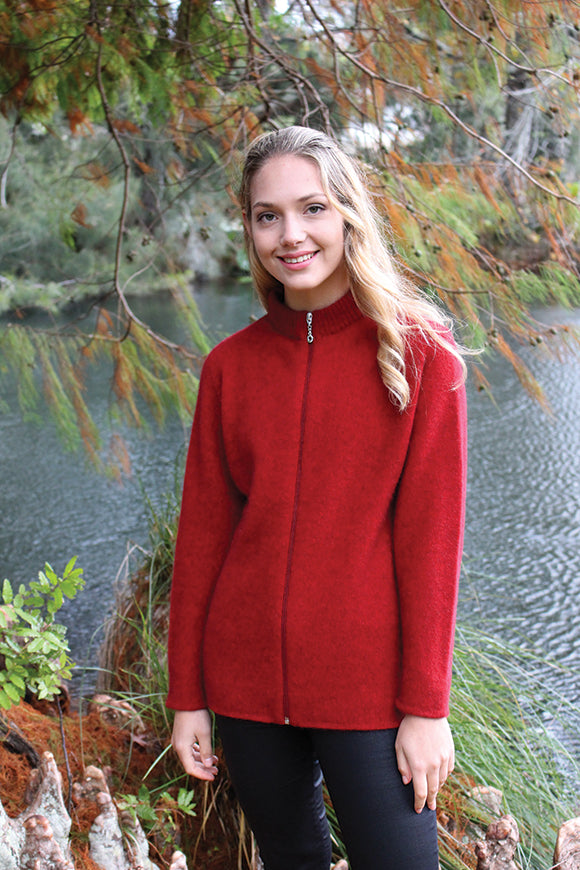 A zip through cardigan in a possum merino blend available in sizes XS-XXL. Made in NZ by Lothlorian. NOTE: * after colour denotes a custom colour to our store, not always readily available. Red.