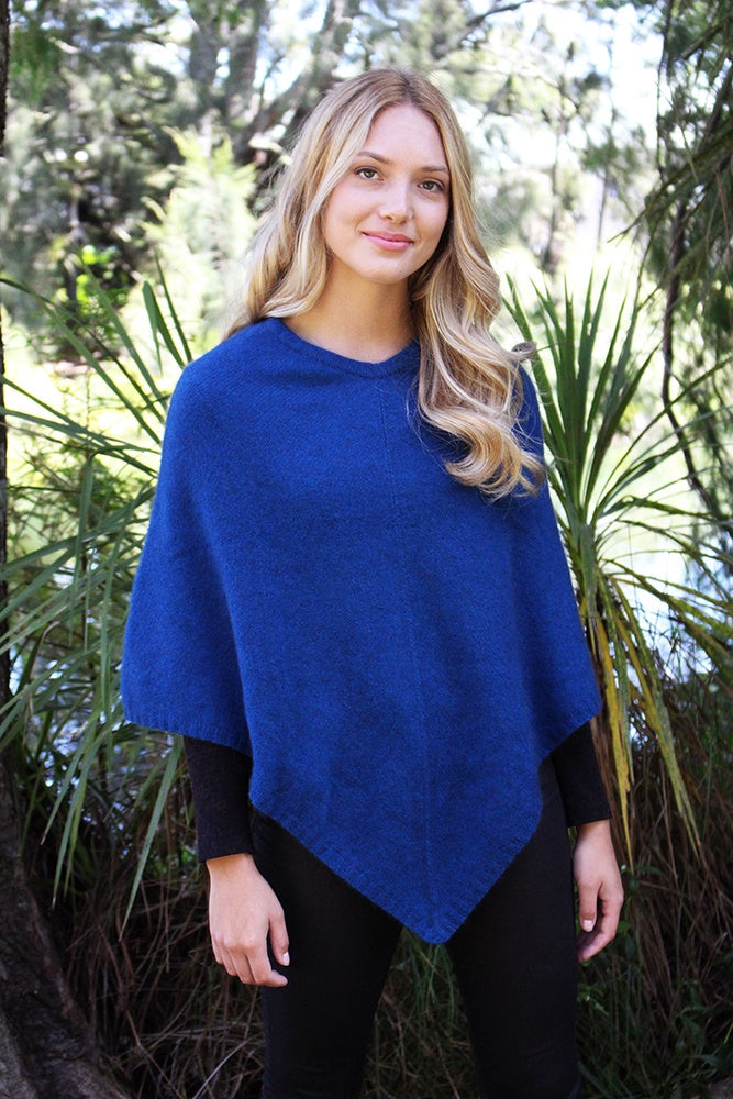 A simple plain poncho with rib neck band and hem.