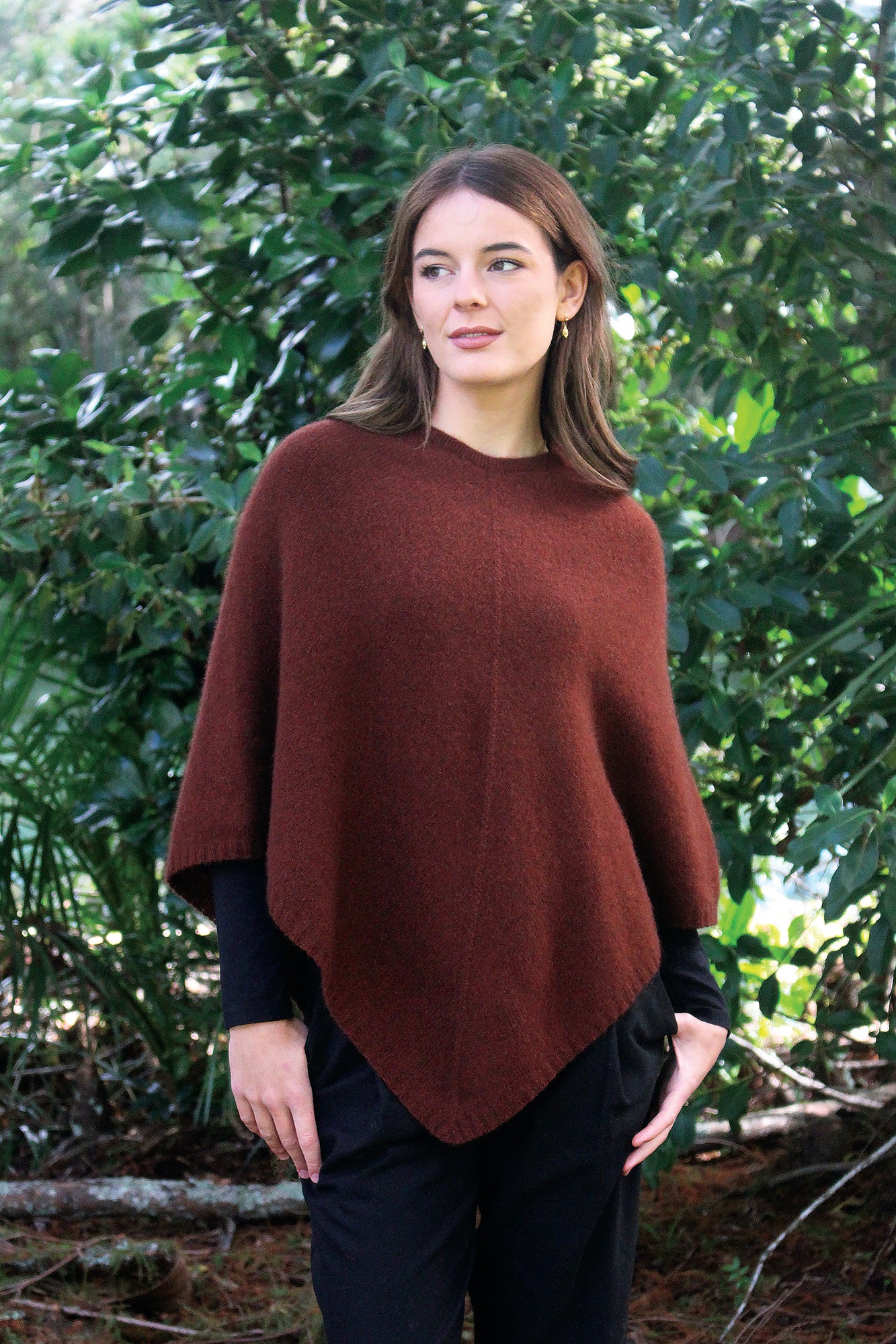 A simple plain poncho with rib neck band and hem.