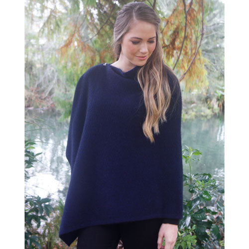 A beautiful textured wrap that can be worn several ways - as a poncho with the zip over the shoulder, zip to the front like a cape, as a wrap or scarf and if you feel a bit daring, a skirt! Available in 12 colourways. Made in NZ by Lothlorian. Midnight.