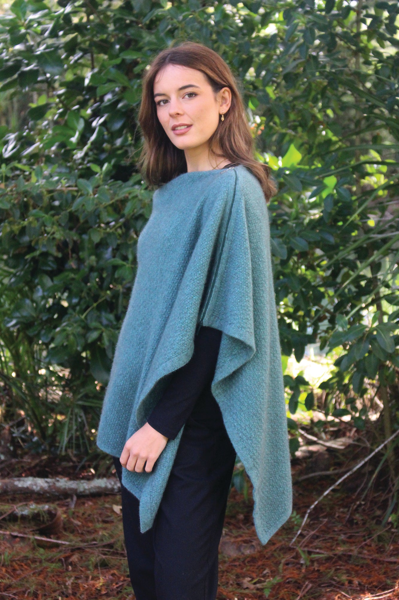 A beautiful textured wrap that can be worn several ways - as a poncho with the zip over the shoulder, zip to the front like a cape, as a wrap or scarf and if you feel a bit daring, a skirt! Available in 12 colourways. Made in NZ by Lothlorian. Sage.