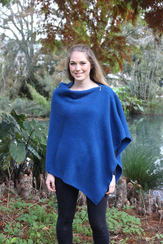 A beautiful textured wrap that can be worn several ways - as a poncho with the zip over the shoulder, zip to the front like a cape, as a wrap or scarf and if you feel a bit daring, a skirt! Available in 12 colourways. Made in NZ by Lothlorian. Lagoon.