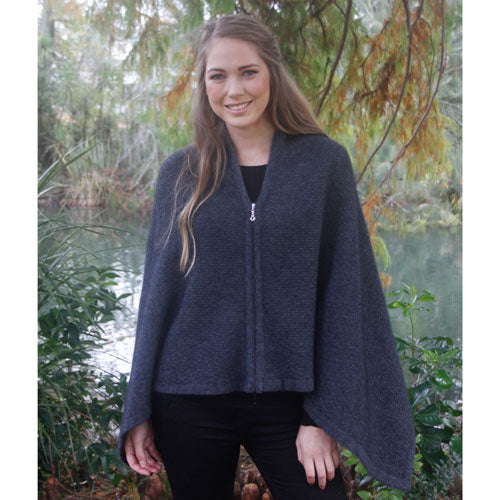 A beautiful textured wrap that can be worn several ways - as a poncho with the zip over the shoulder, zip to the front like a cape, as a wrap or scarf and if you feel a bit daring, a skirt! Available in 12 colourways. Made in NZ by Lothlorian. Charcoal.