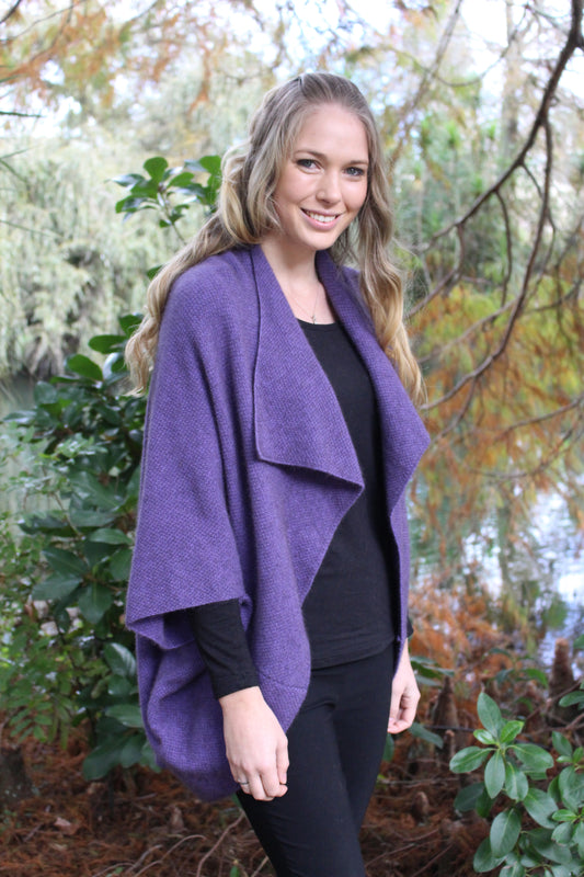 With a wide collar this generous relaxed cape drapes well and is perfect for any occasion.