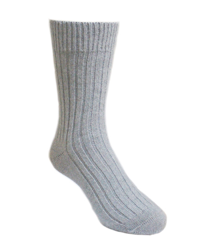 A warm and comfy ribbed sock. Come up to mid-calf length. Available in sizes S, M & L. Made in NZ from Baby Alpaca by Lothlorian. Dove.