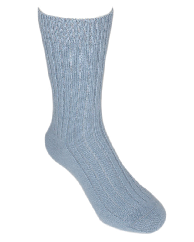 A warm and comfy ribbed sock. Come up to mid-calf length. Available in sizes S, M & L. Made in NZ from Baby Alpaca by Lothlorian. Mist.