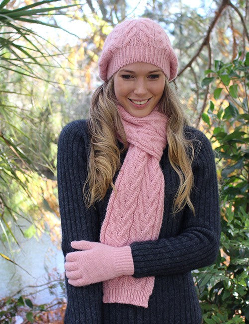 A beautiful chunky cable alpaca scarf with rib ends. Approx. 15cm wide and 176cm long. Made in NZ by Lothlorian. Rose.