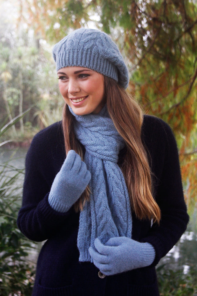 With a generous sized crown this chunky cabled beanie can be worn in a slouch style or move the slouch to the side like a beret! Made in NZ by Lothlorian. Mist