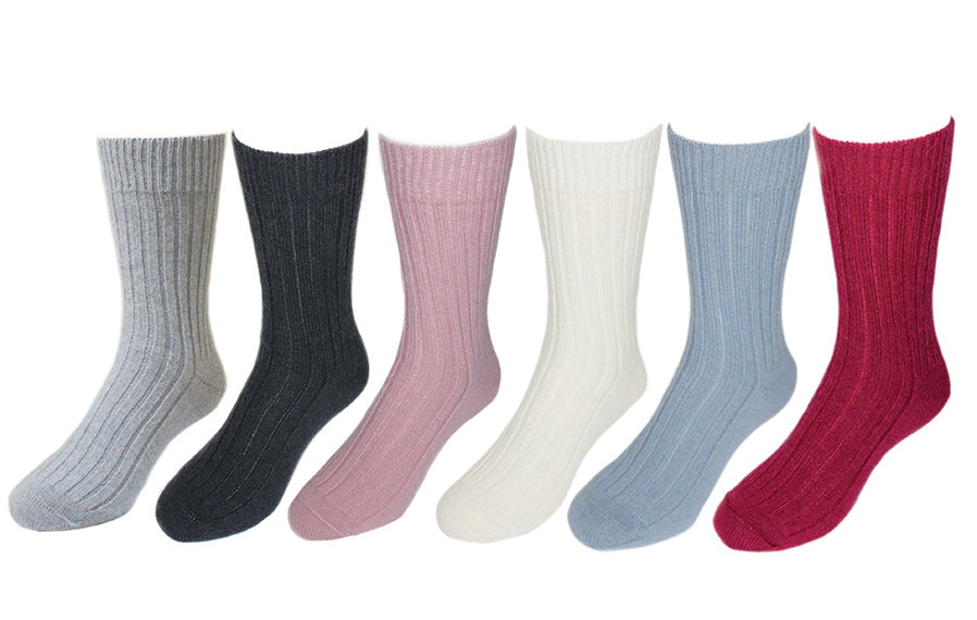 A warm and comfy ribbed sock. Come up to mid-calf length. Available in sizes S, M & L. Made in NZ from Baby Alpaca by Lothlorian. 