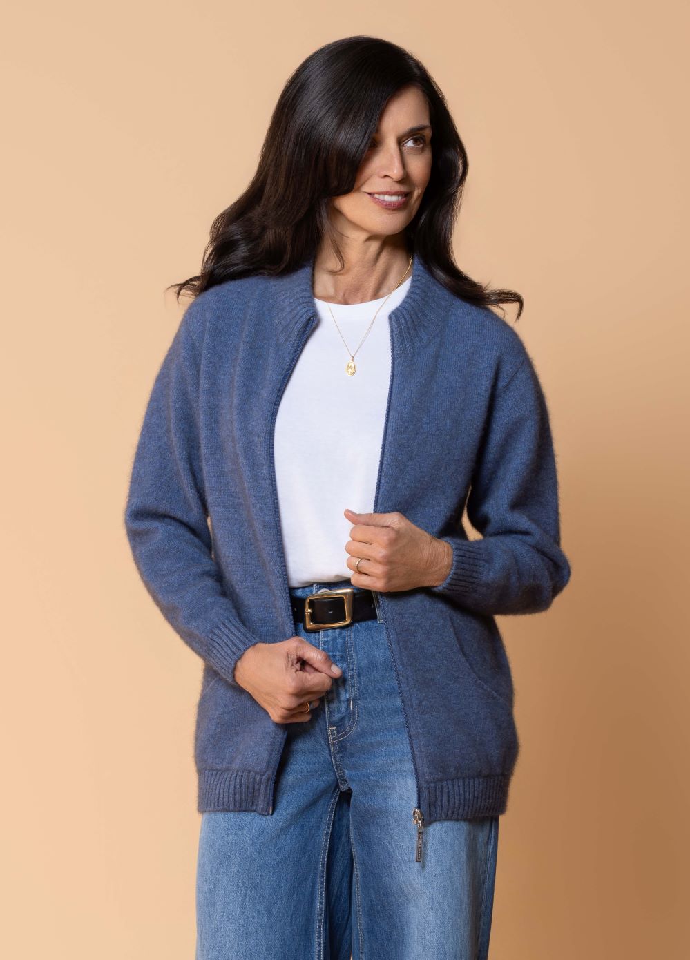 A relaxed, zip-through style designed for effortless layering. With its easy fit and slightly longer length, Aoraki offers added coverage and everyday comfort without compromising on clean, classic lines. Made from a possum, merino and silk blend this jacket is light but very warm. Made by Noble Wilde of NZ.