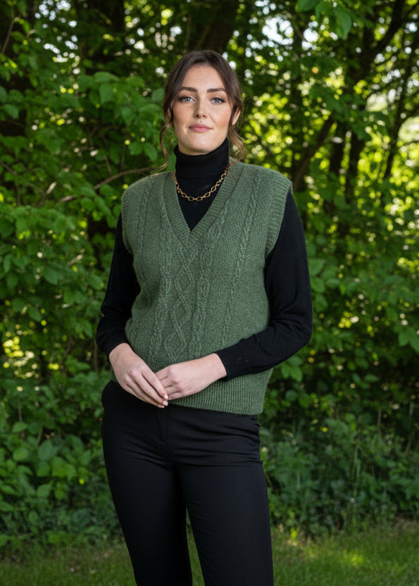 A classic V neck vest in a possum merino blend. A versatile piece for layering up in every season. Crafted with vertical patterns, this vest combines a timeless design with a modern twist. Dress it up for a corporate look or chic look or dress it down for an everyday casual look. It will quickly become a wardrobe staple!!