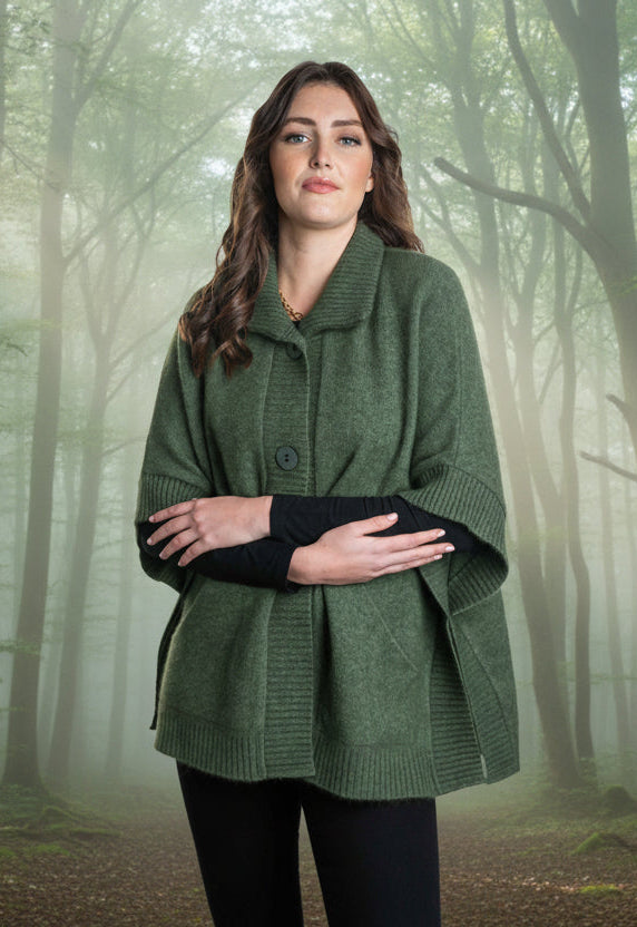 An easy to wear piece which features ribbed trims, knitted-in pockets and beautiful textured buttons. This garment is ideal for layering and is a comfortable slightly oversized fit.
