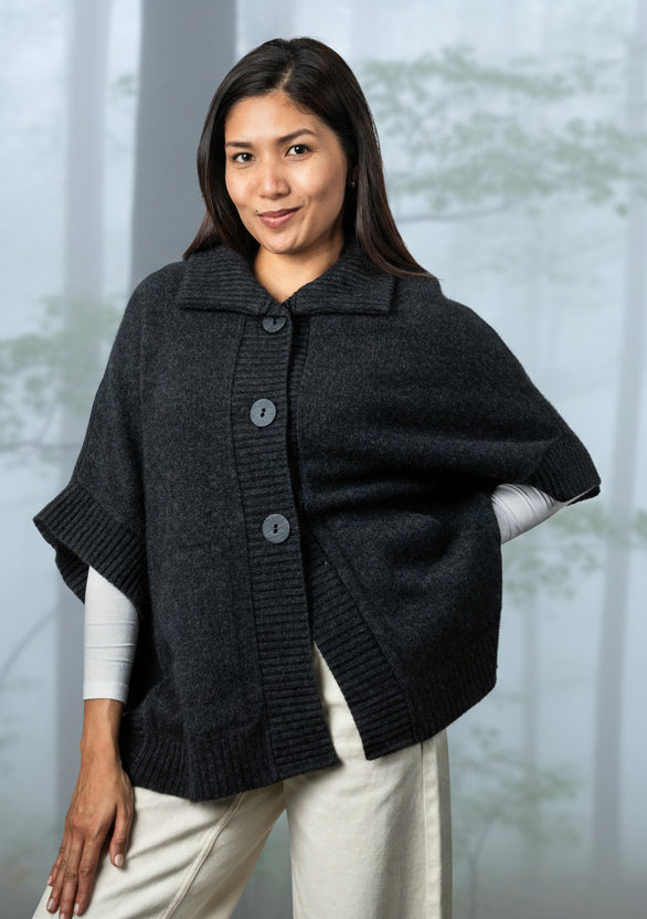 An easy to wear piece which features ribbed trims, knitted-in pockets and beautiful textured buttons. This garment is ideal for layering and is a comfortable slightly oversized fit.