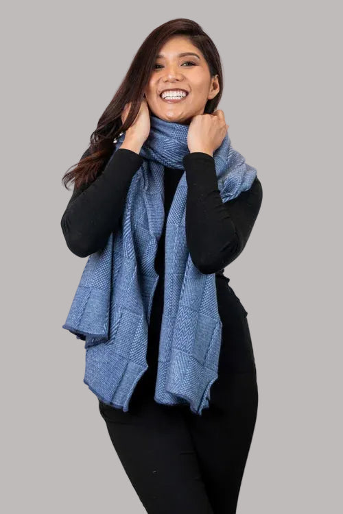 How beautiful is the Jacquard Wrap? A multi-textured design, knitted in two-tone colours with a scallop edge finish. This is the perfect accessory for daytime, a night out or a trip away. Wear it your way to suit your occasion. Luxury at its finest! Approx. 56cm wide x 200cm long. Made by Koru of NZ.