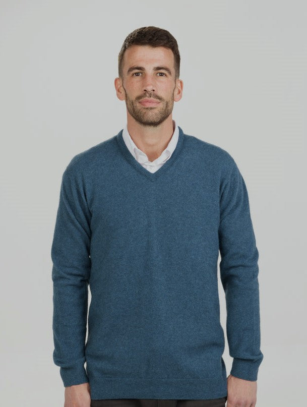 A traditional Vee Neck Jumper made in Native World's Luxury Blend of possum merino & silk. An iconic piece for any man's wardrobe. Dress up or down for any occasion. A regular fit available in sizes S - 3XL. Made at Manawatu Knitting Mills, Palmerston North, NZ.  Marine.