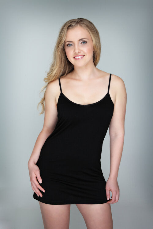 The reversible merino long cami can be worn as a V neck or scoop neck. Made from Super Fine New Zealand Merino in a single jersey knit fabric it is light, soft and so warm. Can be worn year-round. Available in Black or Pearl sizes S - 2XL. Black. NS351