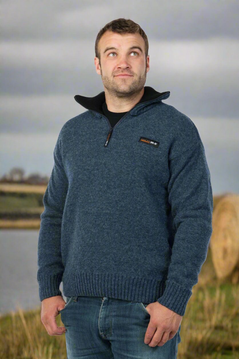 With 36.6 unique double layer technology the classic zip collar Tasman is a hardwearing, heavyweight outdoor style, yet it is still soft to wear. Made with a 100% NZ wool outer layer and super soft EcoBlend lining, developed to help maintain your optimum body temperature (36.6) the Tasman is the perfect jumper for rural life. Women love them too! Available in sizes S - 3XL. Made at the Manawatu Knitting Mills, Palmerston North, NZ.  Flint/Denim.