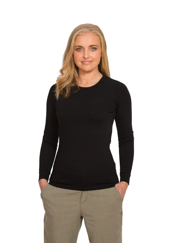 Designed with a crew neck this merino long sleeve tee can be worn on it's own or as a base or mid layer. Has a shaped tail at the back to tuck in. Perfect all year round!! This is a slim fit top so size up if you prefer a little wiggle room. Available in black only. Sizes S - 3XL. Proudly made in NZ. 