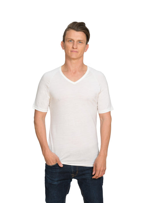 Designed with a vee neck this merino short sleeve tee can be worn on its own or as a base or mid layer. Perfect all year round!! This is a slim fit tee so size up if you prefer a little wiggle room. Available in ivory white only. Sizes S - 3XL. Proudly made in NZ. 