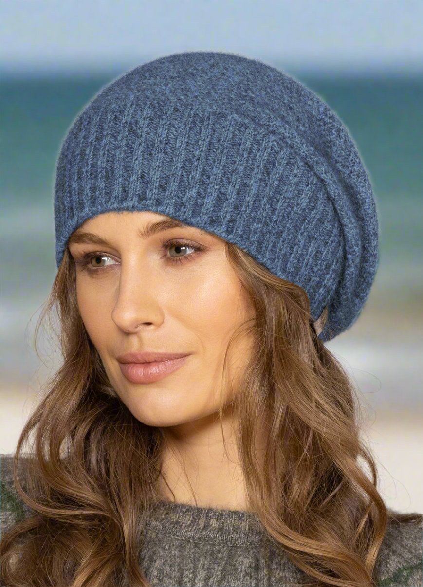 This fashion baggie beanie is knitted in a moss stitch with a rib band that can be worn as is or folded back. Made from a blend of possum merino and available in one size only. Made in Christchurch, NZ by Noble Wilde. 