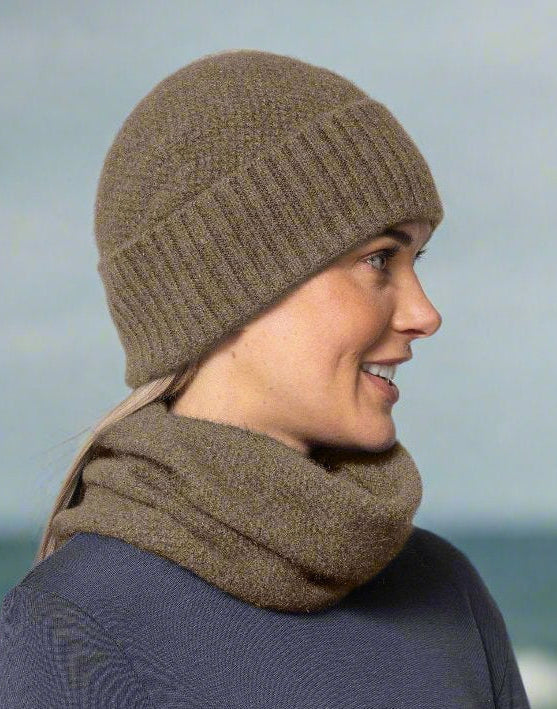 This very cool baggie beanie is knitted in a moss stitch with a rib band that can be worn as is or folded back. Made from a blend of possum merino it will keep you warm as well as looking stylish! Available in one size only. Made in Christchurch, NZ by Noble Wilde.