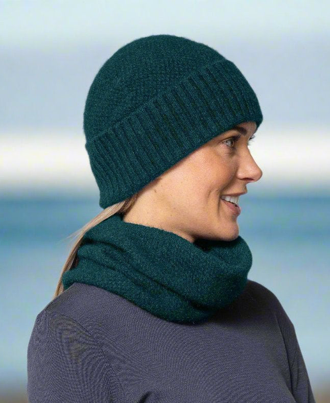 This very cool baggie beanie is knitted in a moss stitch with a rib band that can be worn as is or folded back. Made from a blend of possum merino it will keep you warm as well as looking stylish! Available in one size only. Made in Christchurch, NZ by Noble Wilde.